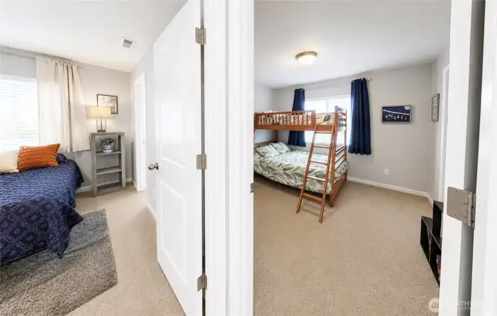 just beyond the upstairs landing, two spacious, secondary bedrooms, offer flexibility for guests, hobbies, or a home office