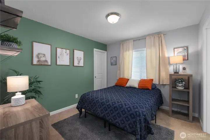 warm, comfortable, & filled with natural light, this bedroom provides a peaceful retreat at the end of the day