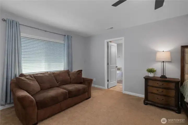 This room easily accommodates additional seating, creating a comfortable place to start & end the day.
