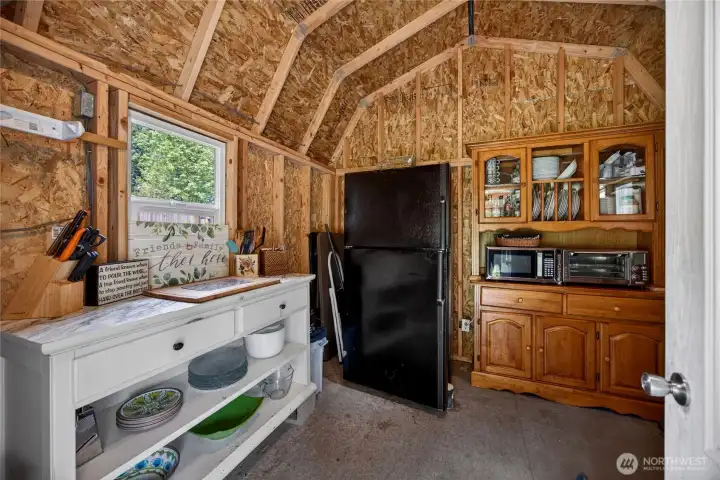 Appliances included: refrigerator (2), microwave, toaster oven and smoker