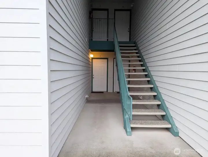 Front door on main floor, no stairs to unit