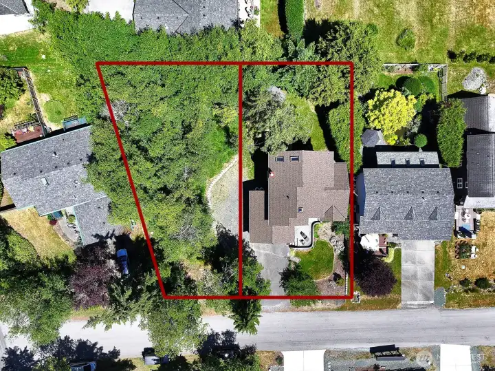 Main home with additional lot