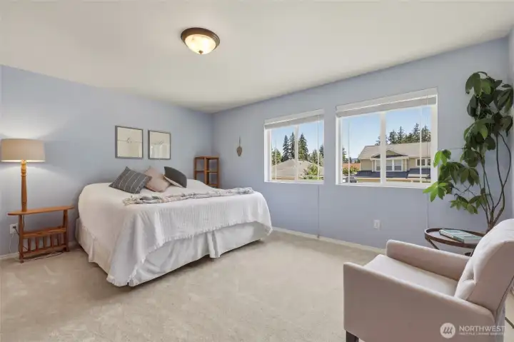 Primary bedroom with brand new carpet and double windows has the most serene feel to it--wait until you step inside. Primary bedroom with brand new carpet and double windows has the most serene feel to it--wait until you step inside.
