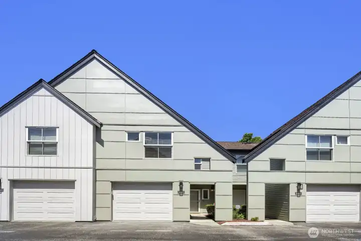 Contemporary design and low-maintenance living in a desirable community.