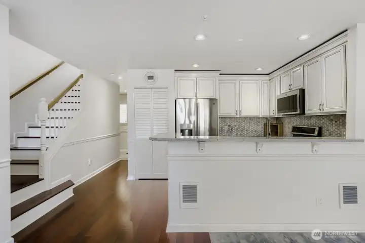 Stylish kitchen featuring abundant cabinetry and prep space.