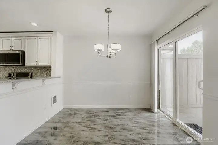 Bright dining area with easy access to outdoor living.