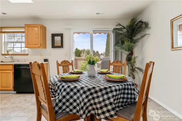 Spacious eat in kitchen has plenty of room for formal dining.
