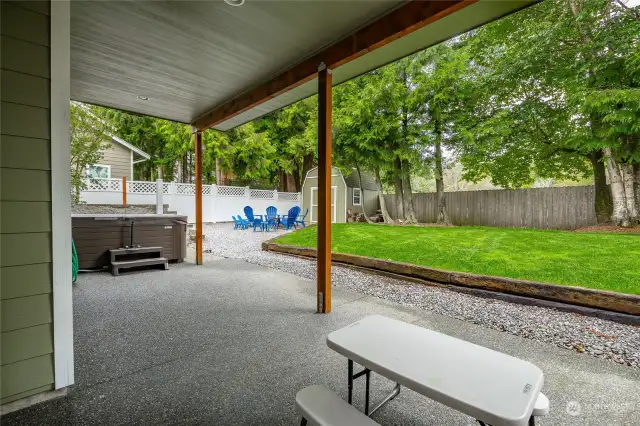 Covered patio outside of basement, Hot tub stays with the home.