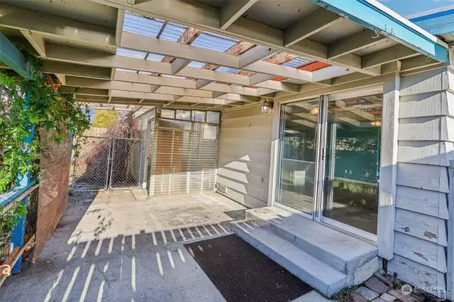 Covered porch facing greenhouse