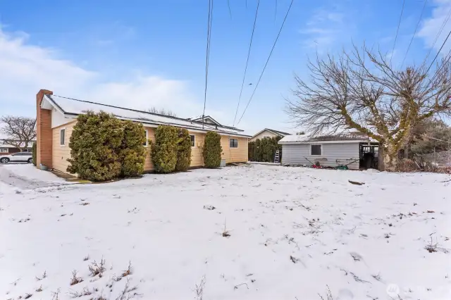 rear of home, showing storage shed