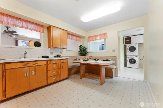 Built-in banquet seating- open to utility room