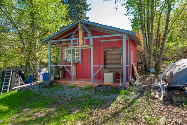 Outbuilding with small kitchenette and loft
