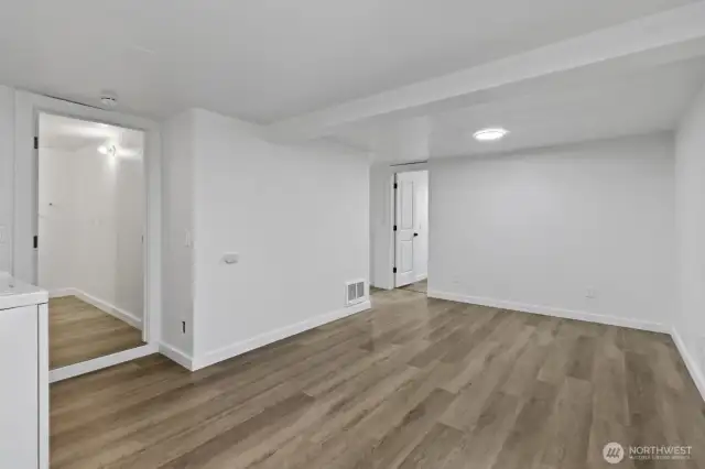 Downstairs rec room showing entry for 2nd full bath