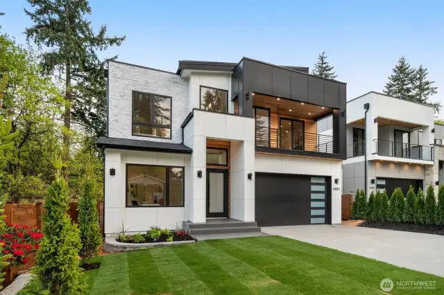 Large front yard and long driveway with ample guest parking