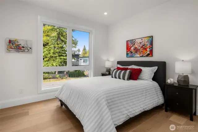 Spacious secondary bedrooms with oak hardwood floors
