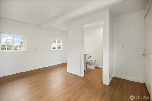 Main Floor Primary Bath with door to deck