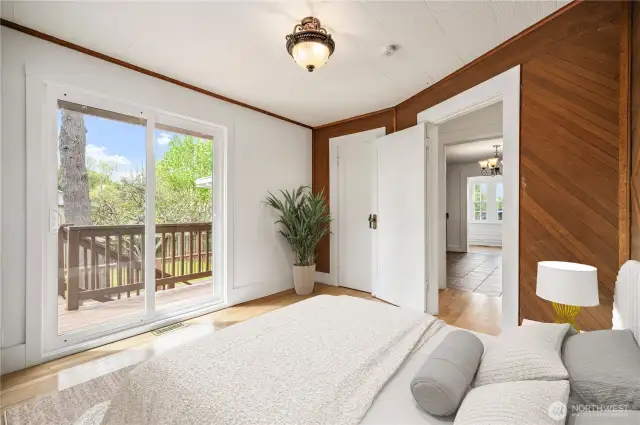 Main Floor bedroom with new slider - virtually staged