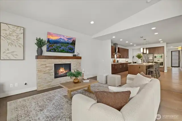 Grab a book and relax in the welcoming family room around the cozy gas fireplace.