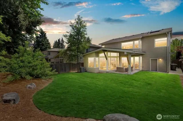 Lovely view of the back of the home @ twilight.