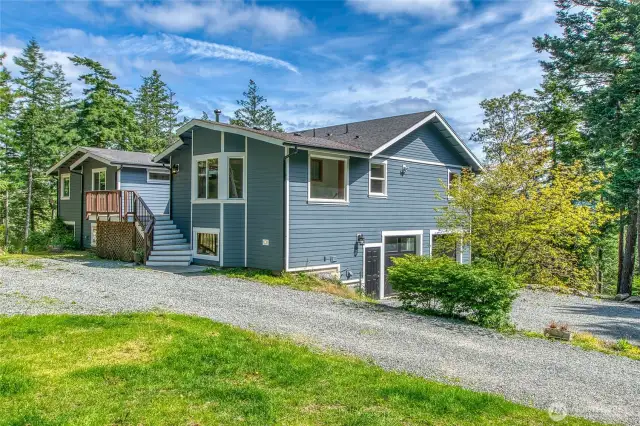 4 bedroom home built in 2007 and remodeled in 2024, with lovely light on 4 acres. The possibilities feel endless.
