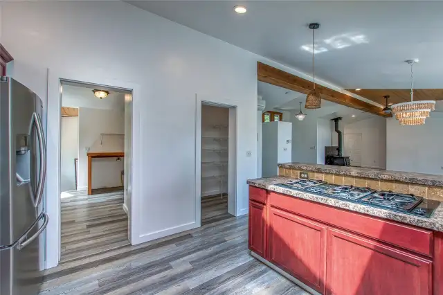 Walk-in pantry and utility room off of kitchen.