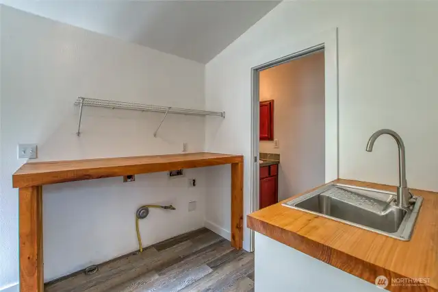 Utility Room and half bath off of kitchen on main level.