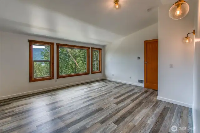 Primary Bedroom on main floor with nice light and space.