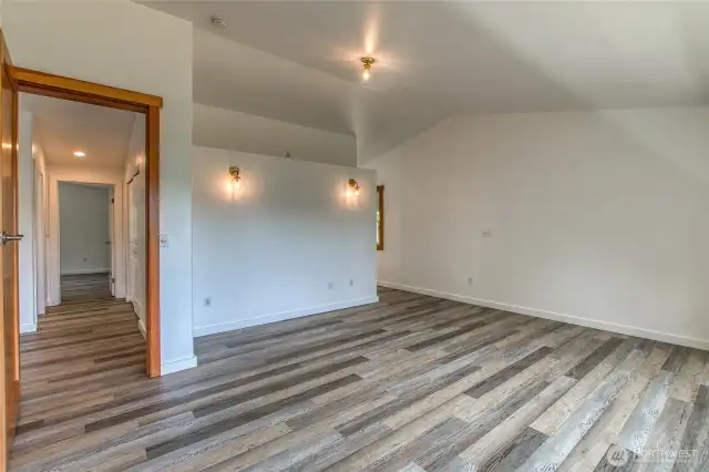 Spacious primary at a different angle on the main floor.