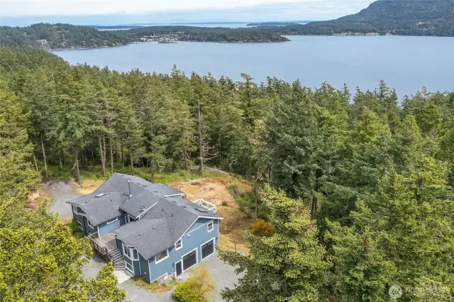 Aerial view of this lovely home and property.