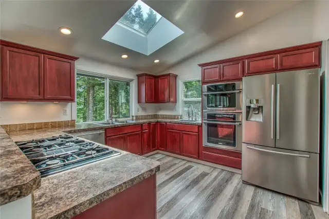 Spacious kitchen with eating space, open to the living room.