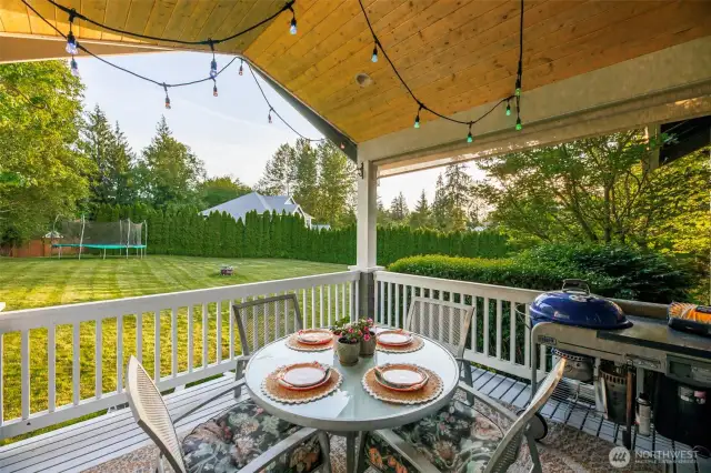 Covered Back Deck overlooking level back yard.