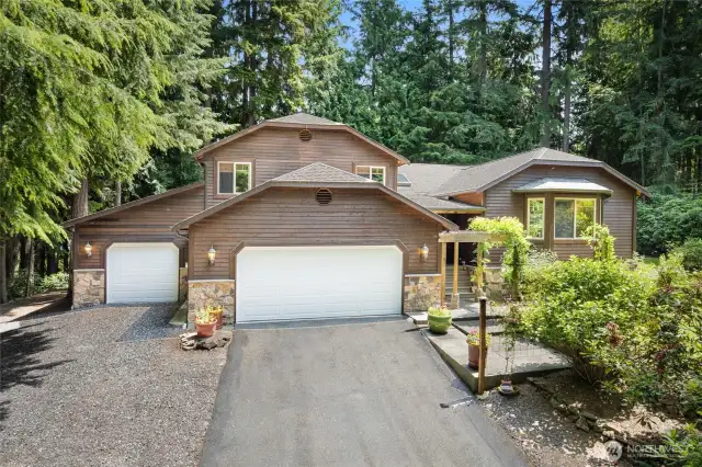 Lovely home with brand new garage doors.
