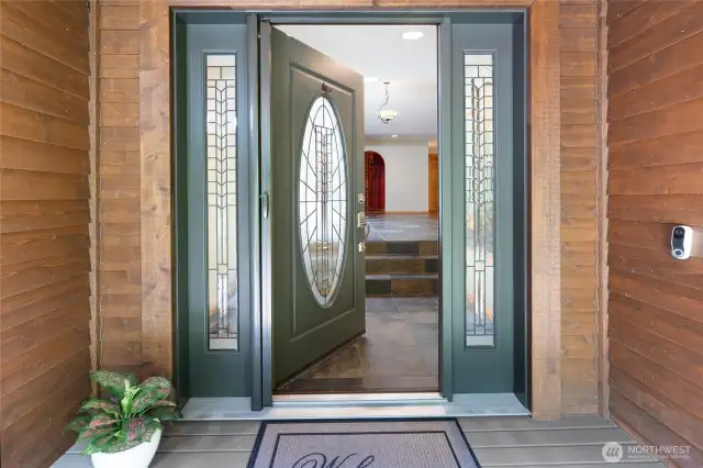 Entry with lighted coat closet.