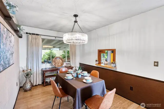 Large dinning room with pass through window.