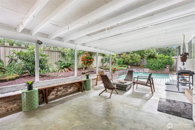 The covered patio is great for grilling and hanging out outside even on rainy days.