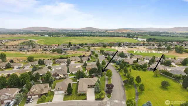 Spacious corner lot across from large greenspace/park area