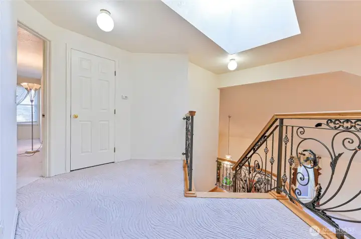 Second floor landing with closet.