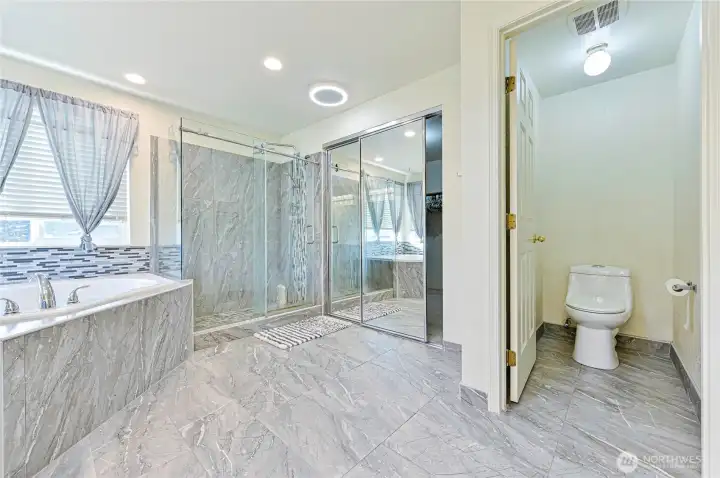 Don't miss the large walk in closet behind the sliding mirrors!