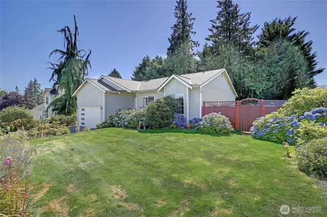 South facing with lovely front yard