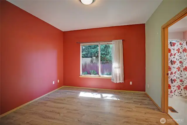 primary suite with views of beautiful backyard