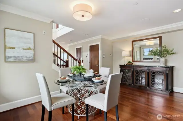 The dining room works well with a round table, but a rectangle or square works equally well.