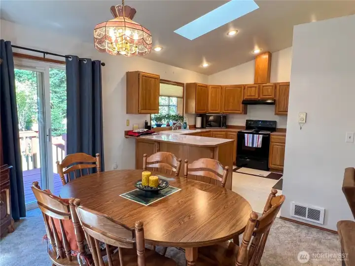 Dining and access to back deck for cook-outs