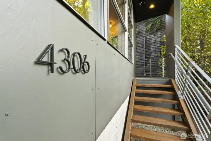 Design aficionados will love this custom-built home from the moment you approach the entry.