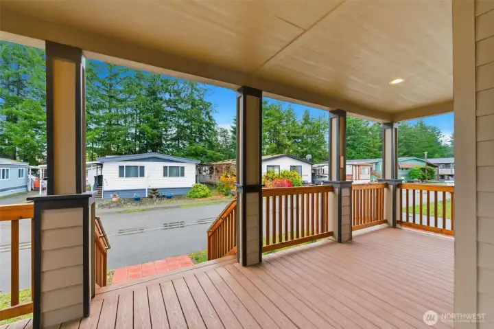 Enjoy morning coffee or evening chats on the expansive covered front porch with room to unwind year-round.