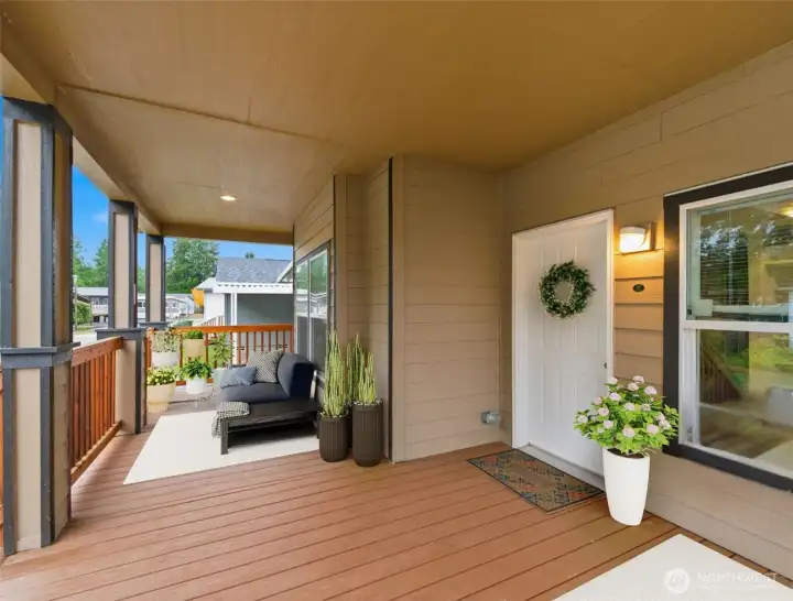 Recessed lighting and a spacious layout create the perfect spot to relax, read, or visit with neighbors. (photo virtually staged)