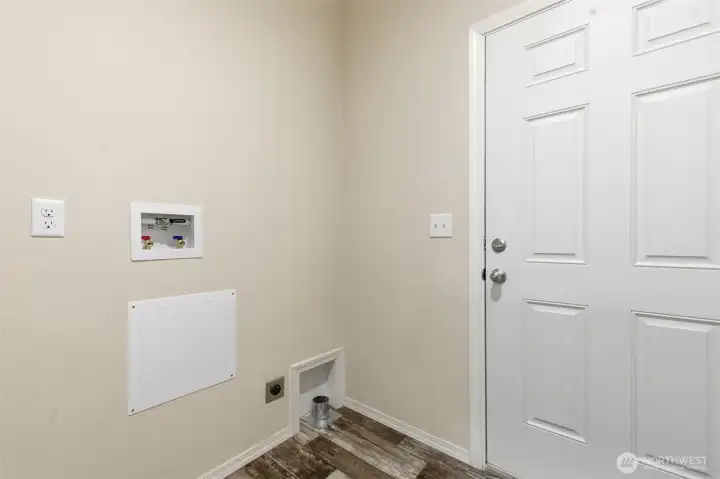 Utility room with extra storage keeps everyday chores simple and organized.