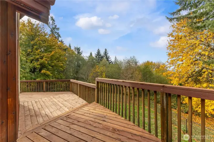 Beautiful new 1000+ foot deck with sliding door from kitchen & living room & primary suite