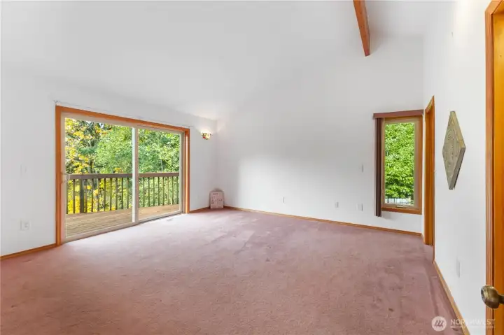 Primary Suite on main with access to the deck