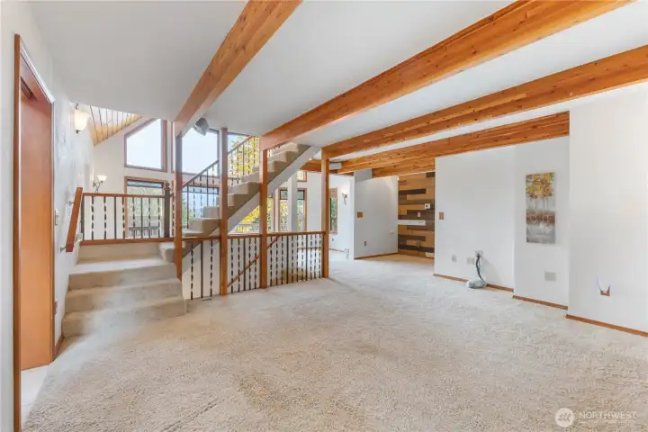 Family room off kitchen, stairs to loft and lower level