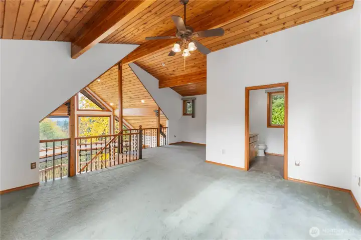 Upper loft possible 4th bedroom. Enjoy the view from the floor to ceiling windows. Also has it own full bathroom